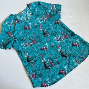 Dr Seuss light blue, turquoise, pink & white scrub top.  Cat in the hat.